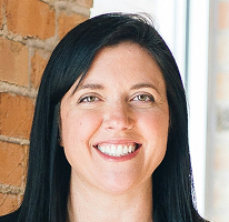 Portrait of Sophie Hartwell, head of customer support on the service team